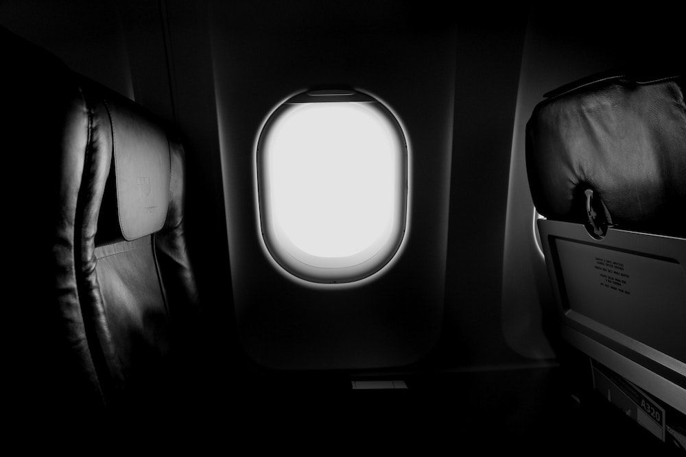 Plane window view, live where you work, travel for work.